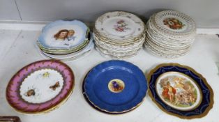 A collection of 19th/20th century Continental porcelain wall plates including a Royal Worcester