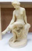 A 19th century Italian carved alabaster figure of a seated lady after the Antique,45cm