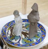 A Lladro figure of a monk, a Nao figure of a girl and an Isnik style dish (3)