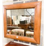 A late Victorian antique style pine cushion mirror, width 70cm, height 66cm