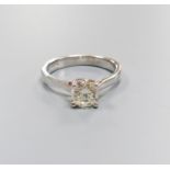 A modern white gold and solitaire diamond ring, size N, gross weight 4.6 grams,the stone weighing