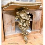 An Italian carved pine gilt console table, width 66cm, depth 38cm, height 67cm