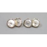 A pair of 18ct, mother of pearl and diamond set disc cufflinks,14mm, gross 7.7 grams.