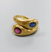 An 18ct yellow gold double 'cobra' ring, sapphire and ruby set, size Q/R, gross 7.6 grams.
