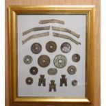 A quantity of framed Chinese coins