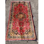 A Kashan rug, 186 x 93cm