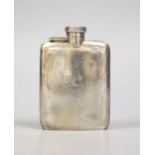 A George V silver hip flask, Birmingham, 1915, 10.1cm, 117 grams.