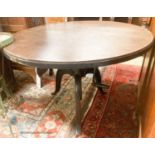 An industrial style circular oak adjustable table, diameter 100cm