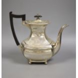 A George V silver coffee pot, by Walker & Hall, Sheffield, 1913, gross 27oz.