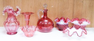 A group of Victorian Cranberry glass dishes, two vases and a Claret jug, tallest 23.5 cm (7)