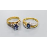 Two modern 18ct gold, sapphire and diamond set dress rings including three stone sizes I & P, gross