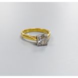 A modern 18ct gild and solitaire diamond ring, size M, gross weight 4.3 grams,the central stone