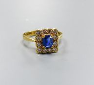 A modern 18ct gold, sapphire and diamond set square cluster ring, size M, gross weight 4.2 grams,