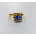 A modern 18ct gold, sapphire and diamond set square cluster ring, size M, gross weight 4.2 grams,