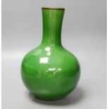 A Chinese green crackle glaze monochrome bottle vase, 24 cm high