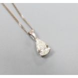 A modern white metal and solitaire pear shaped diamond set pendant, overall 14mm, on and 18ct white