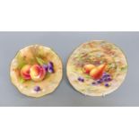 A Royal Worcester fruit painted pedestal dish signed A Shuck and a similar plate signed E Barnes,