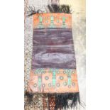 An African tribal mat, 128 x 62cm