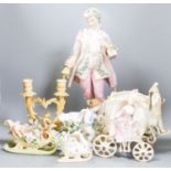 A bisque carriage centrepiece, a Continental figure and decorative items