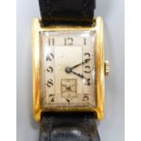 A gentleman's 1930's 18ct gold Aster manual wind rectangular dial wrist watch, on a leather strap,