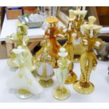 A collection of eight Murano amber glass figures, tallest 42cm