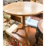 A George III circular mahogany tilt top tea table, diameter 65cm, height 70cm