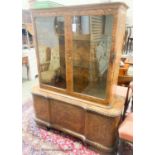 A 1930's walnut veneered china display cabinet combined cupboard, length 130cm, depth 46cm, height