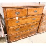 A late Victorian oak chest of drawers, width 120cm, depth 50cm, height 160cm