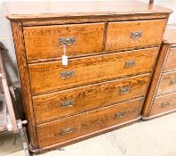 A late Victorian oak chest of drawers, width 120cm, depth 50cm, height 160cm