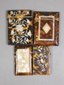 Four Victorian tortoiseshell and mother of pearl card cases, largest 10.5 cm