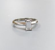 A modern platinum and solitaire rectangular cut diamond ring, size L, gross 4.5 grams,the stone