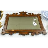 A walnut fret cut wall mirror48x52cm