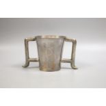 A stylish late Victorian planished Brittania standard silver two handled mug, Hamilton & Inches,