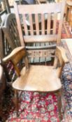 An early Victorian elm and beech Windsor armchair, width 54cm, depth 44cm, height 112cm