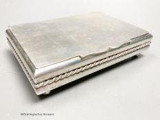 A 20th century Cartier sterling mounted rectangular cigarette box, on bun feet,signed on base, 13,