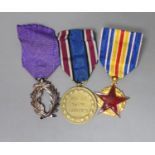 Three medals, including a Polish commemorative war medal (1918-1921), a Franco-Canadian Order of