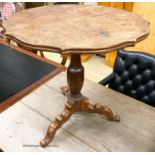 An early 20th century circular oak tripod table, W.67cm H.69cm