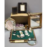 A group of objects of vertu, various frames, magnifying glasses etc.