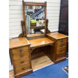 A late Victorian inlaid oak Aesthetic movement dressing table by Garnett & Son, Warrington, width