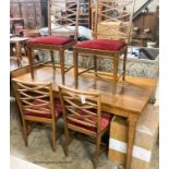 A Swedish walnut and beech dining suite comprising rectangular table. 200cm extended (two spare