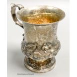 An early Victorian silver vase shaped christening mug, embossed with leaves, Brown & Somersall,