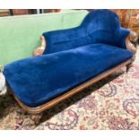 A Victorian carved oak chaise longue, W.180cm D.82cm H.84cm