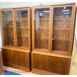 A pair of Harrods teak display cabinets, width 108cm, depth 43cm, height 196cm