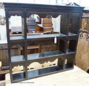 An 18th / 19th century oak three-shelf hanging plate rack, width 107cm, depth 18cm, height 98cm