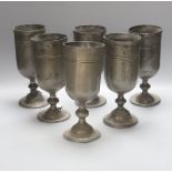 Six various 18th/19th century pewter goblets, worn touchmarks, tallest 12cm