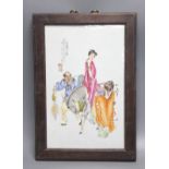 A Chinese framed poreclain plaque, painted with figures and script, height 44cm incl. frame