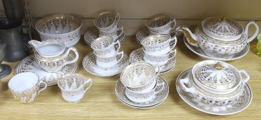 An early 19th century English porcelain gilt decorated part tea and coffee set