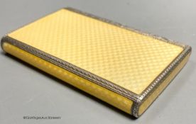 A 1920's continental silver and yellow guilloche enamel rectangular box and hinged cover, import