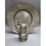 A 17th century pewter charger (possibly Nicholas Kelk) 47cm and a late 17th century pewter flagon,