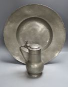 A 17th century pewter charger (possibly Nicholas Kelk) 47cm and a late 17th century pewter flagon,